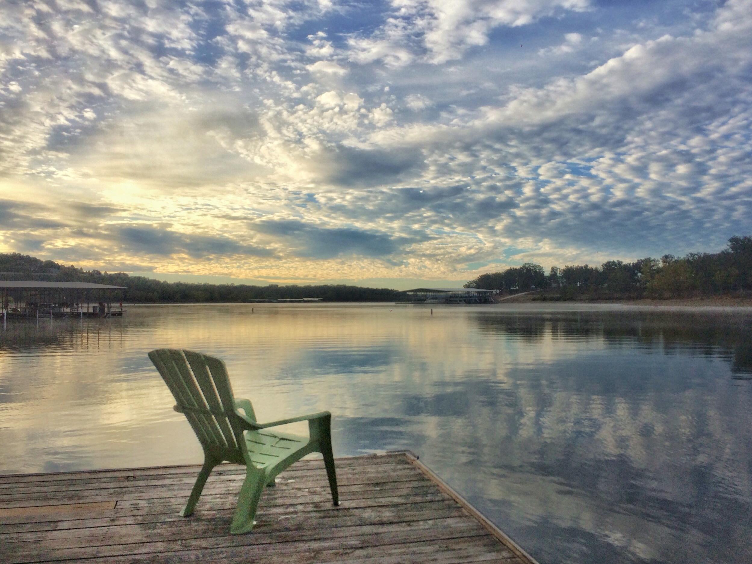 Chair on dock looking at lake